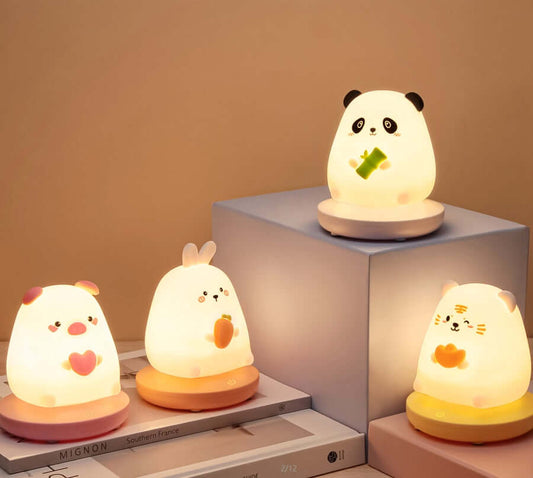 Bear, Panda, Pig and Rabbit Silicone Nightlights on a display stand